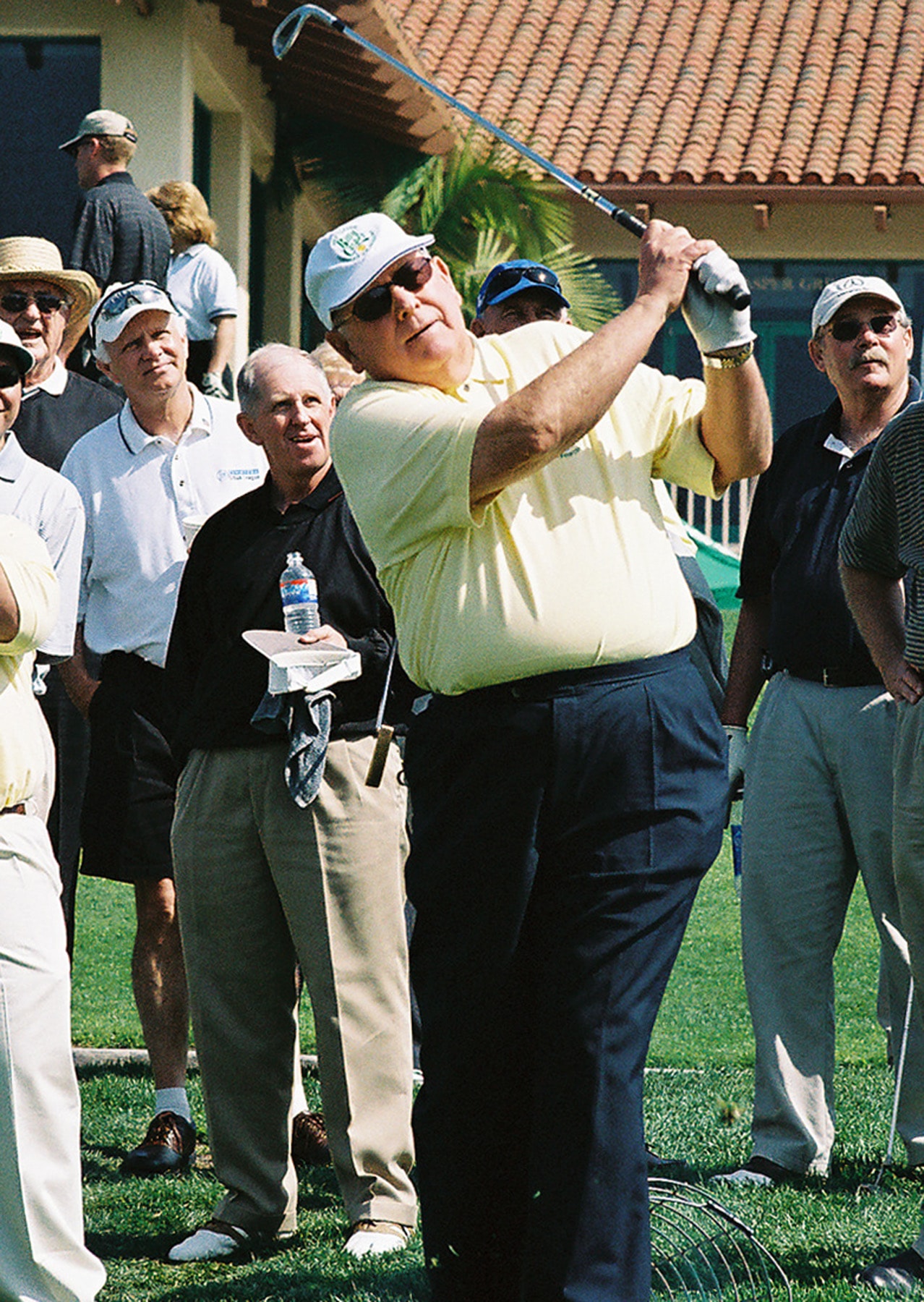 Billy Casper swinging at a golf tournament